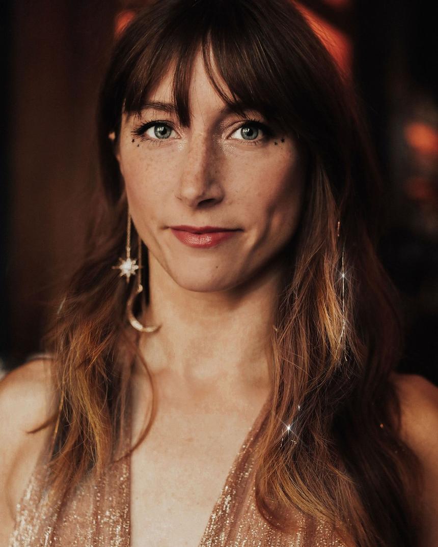 Warm portrait, fine sparkle strands running through long hair