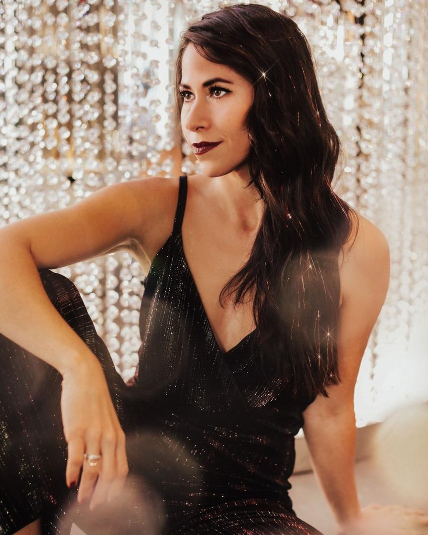 Long dark hair with sparkle strands against a crystal backdrop